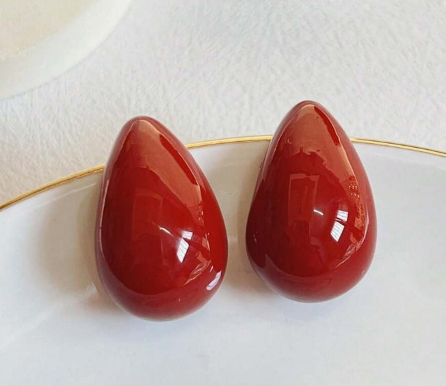 Red teardrop shaped earrings